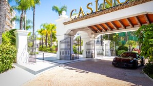 A gated entrance with a sign reading "CASINO" above. - Pto. Banús, modern, bright, 2-bedroom Apart., pool (Puerto Banús)