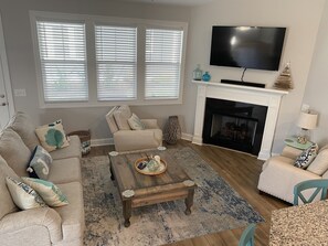 Smart TV, fireplace, ping pong, music library