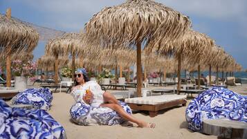 Private beach, sun loungers, beach umbrellas, beach bar