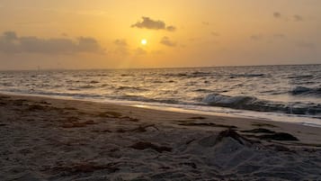 On the beach, sun-loungers, beach towels