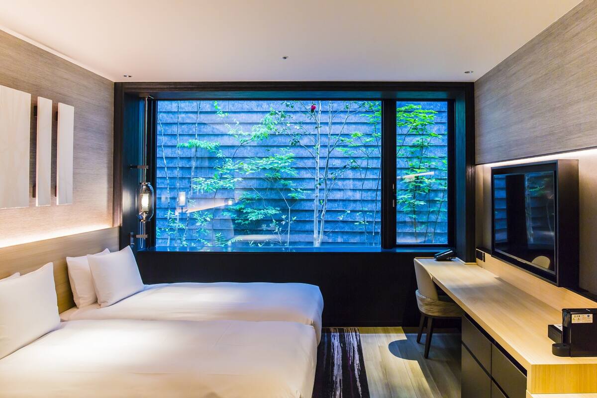 Phòng Deluxe, 2 giường đơn, bồn tắm | Chăn bông, két bảo mật tại phòng, bàn, màn/rèm cản sáng 