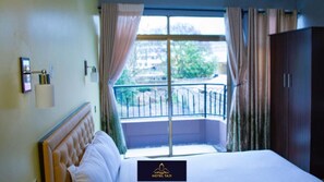 Deluxe Room | Bed sheets - Hotel Taji (Nanyuki)