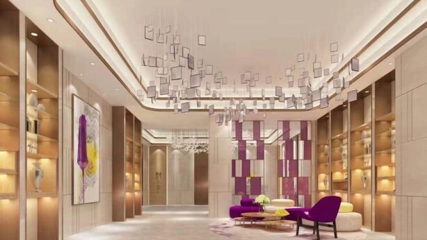 A modern hotel lobby with a central seating area, a chandelier, and bookshelves along the walls. - Lavande Hotel (Shenzhen Airport Fuyong Metro Station) (Shenzhen)
