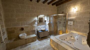 Deluxe Room | Bathroom | Designer toiletries, hair dryer, bathrobes, slippers