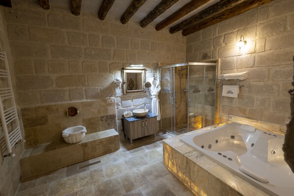 Deluxe Room | Bathroom | Designer toiletries, hair dryer, bathrobes, slippers
