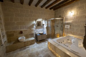 Deluxe Room | Bathroom | Designer toiletries, hair dryer, bathrobes, slippers