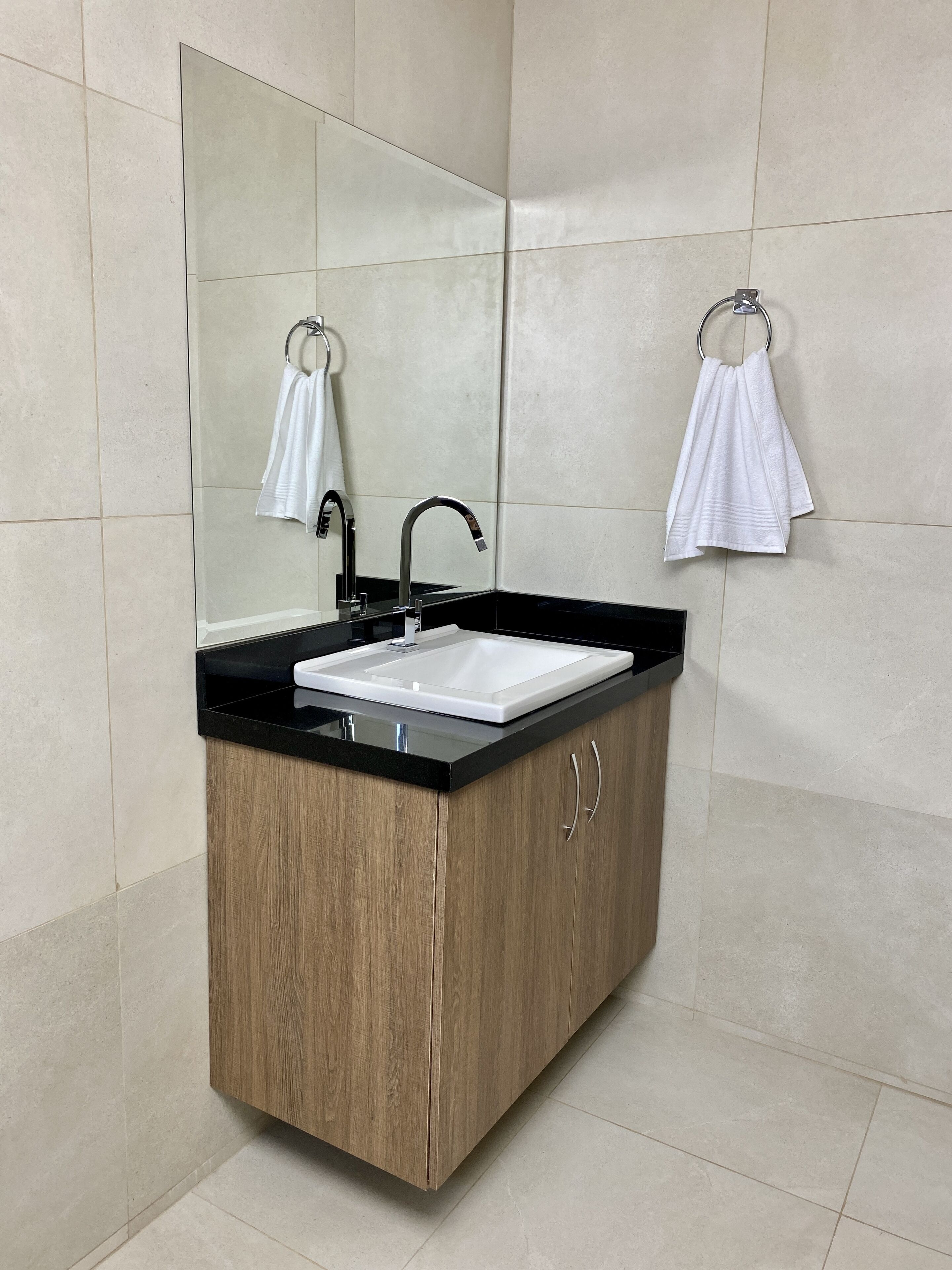 traditional room | bathroom | shower, hair dryer, towels, toilet paper