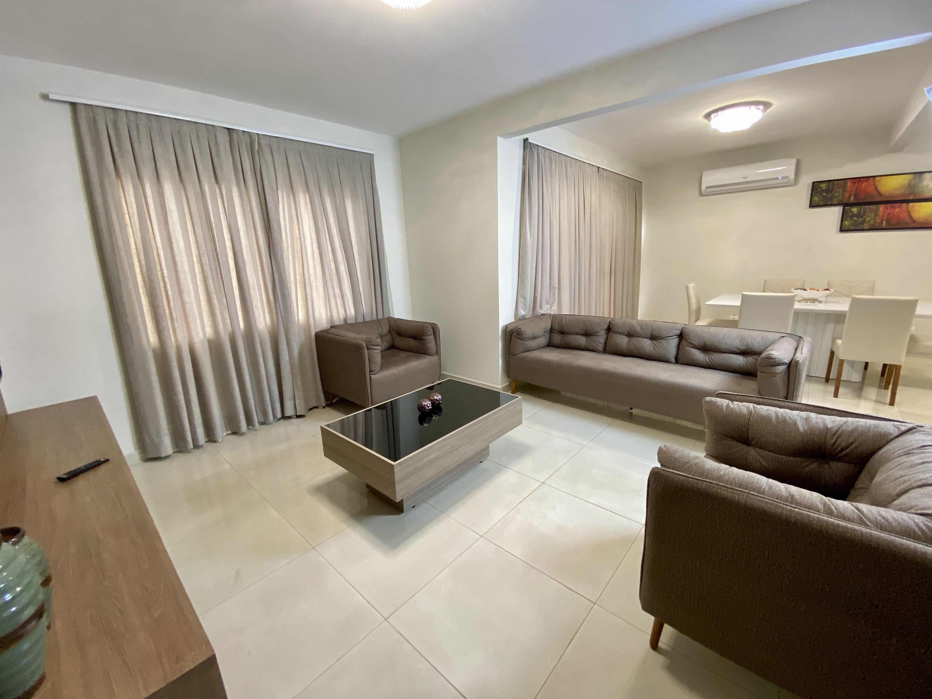 comfort apartment | living area | 32-inch smart tv with satellite channels, tv