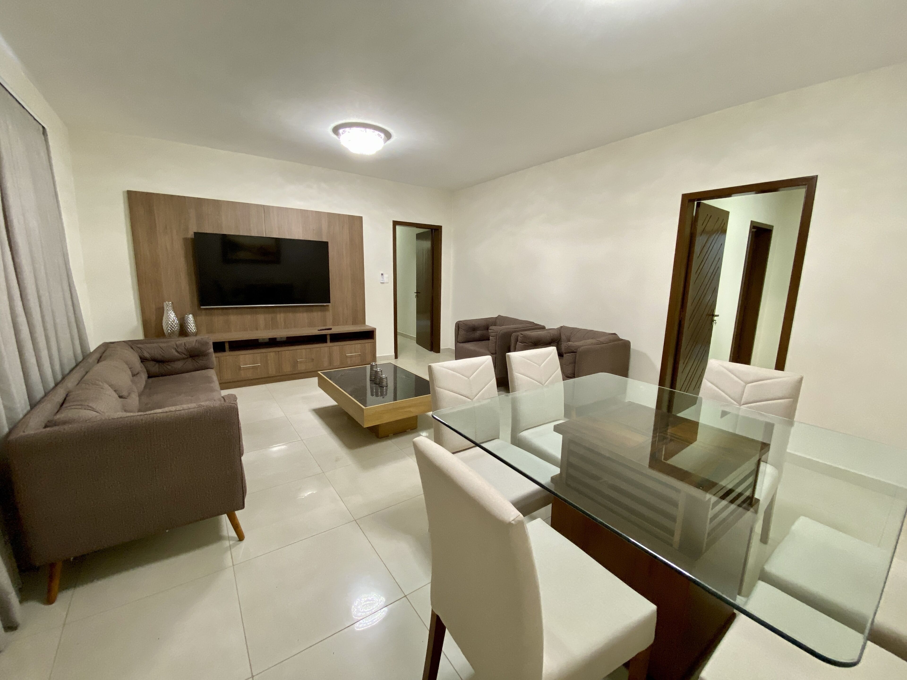 deluxe apartment | living area | 32-inch smart tv with satellite channels, tv