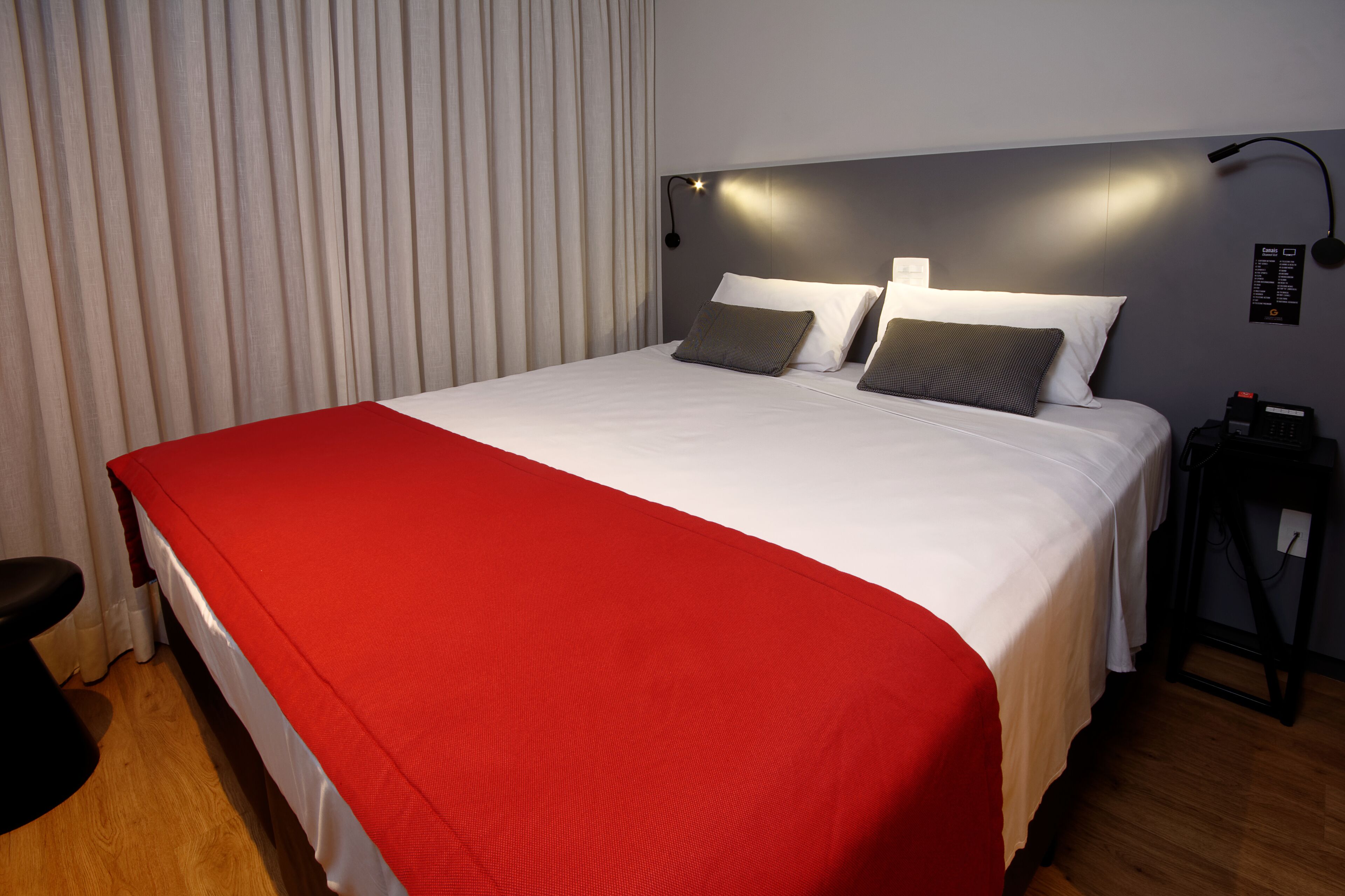 Standard Double Room | Minibar, in-room safe, laptop workspace, blackout drapes