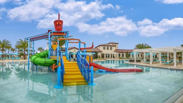 A water park with slides and a pool.