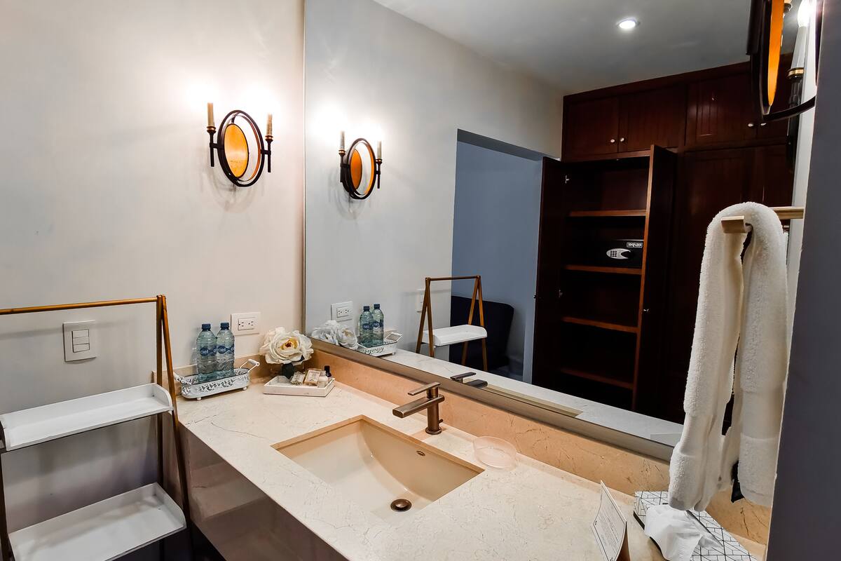 junior suite | 1 bedroom, in-room safe, desk, laptop workspace