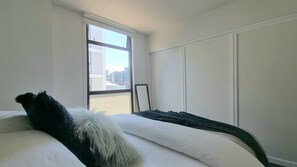 2 bedrooms, desk, laptop workspace, iron/ironing board