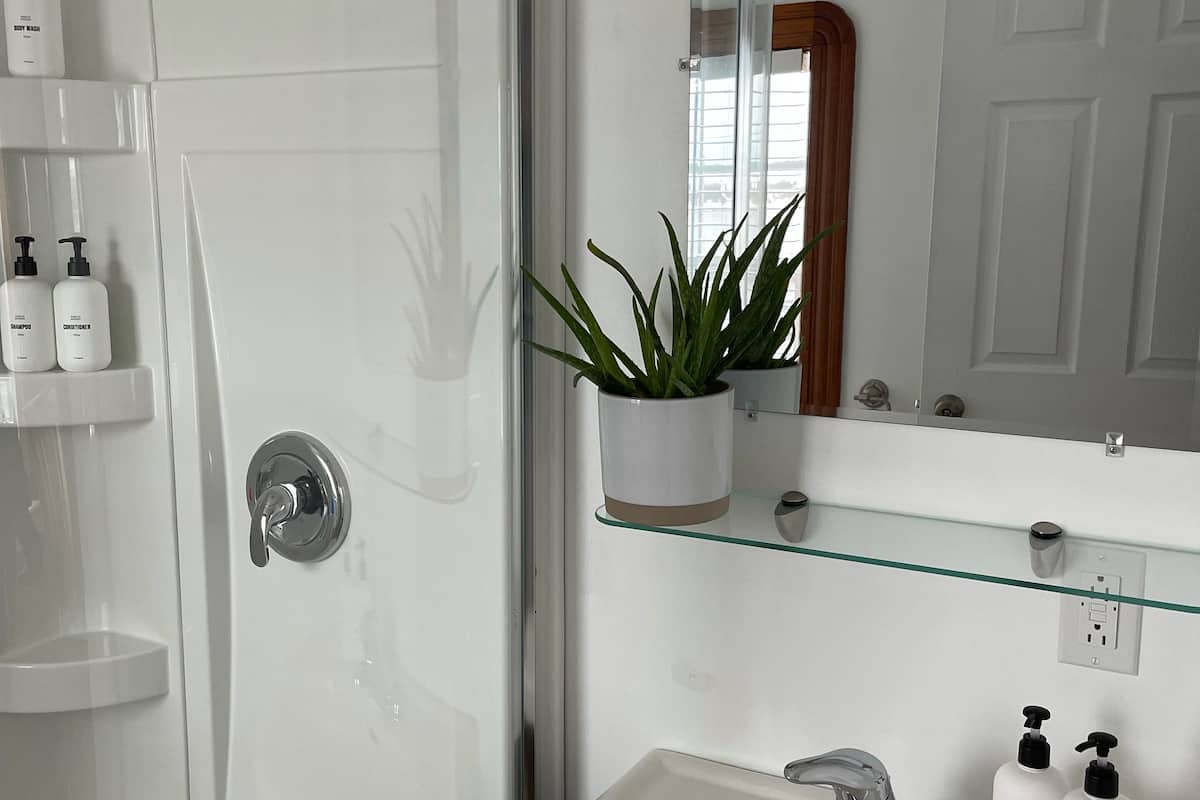 designer toiletries, hair dryer, dressing gowns, towels