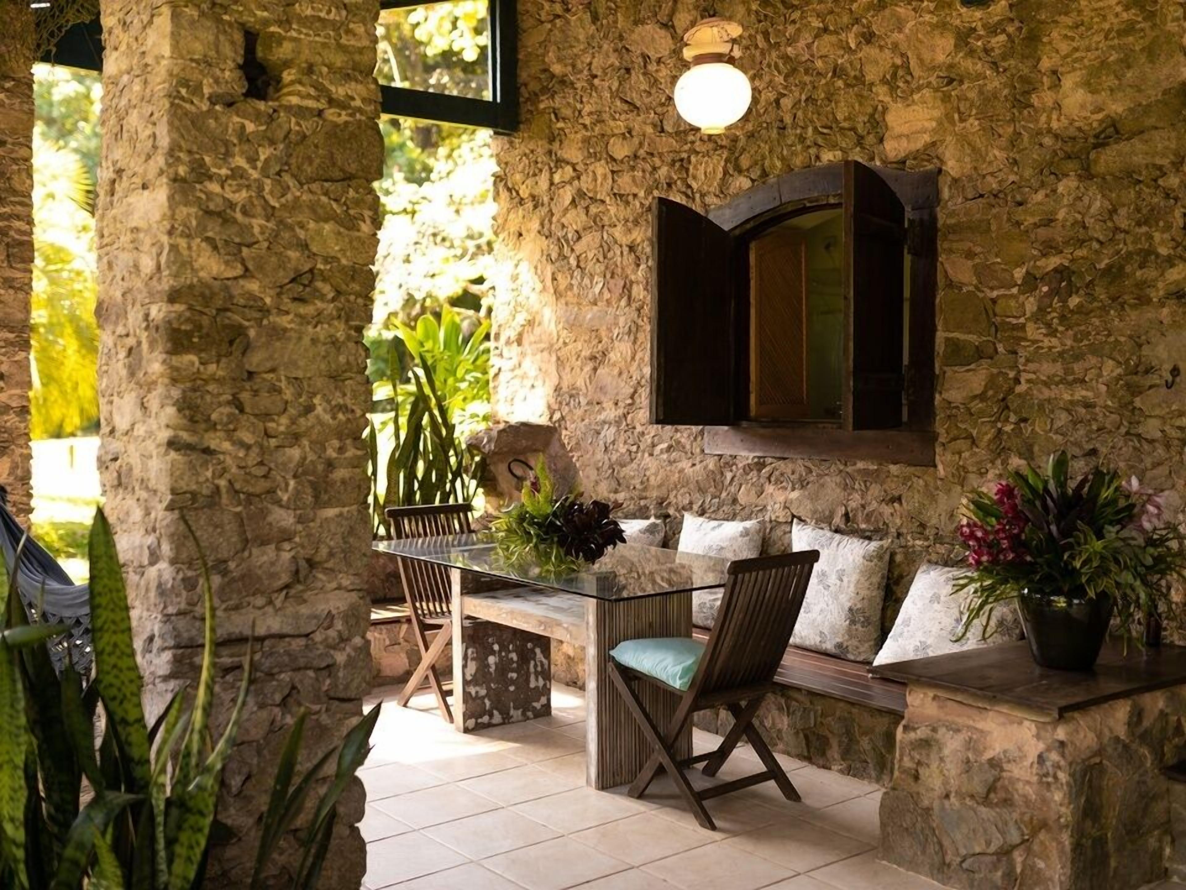 Casa da Pedra | Varanda coberta