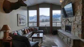 Smart TV, fireplace, foosball, books