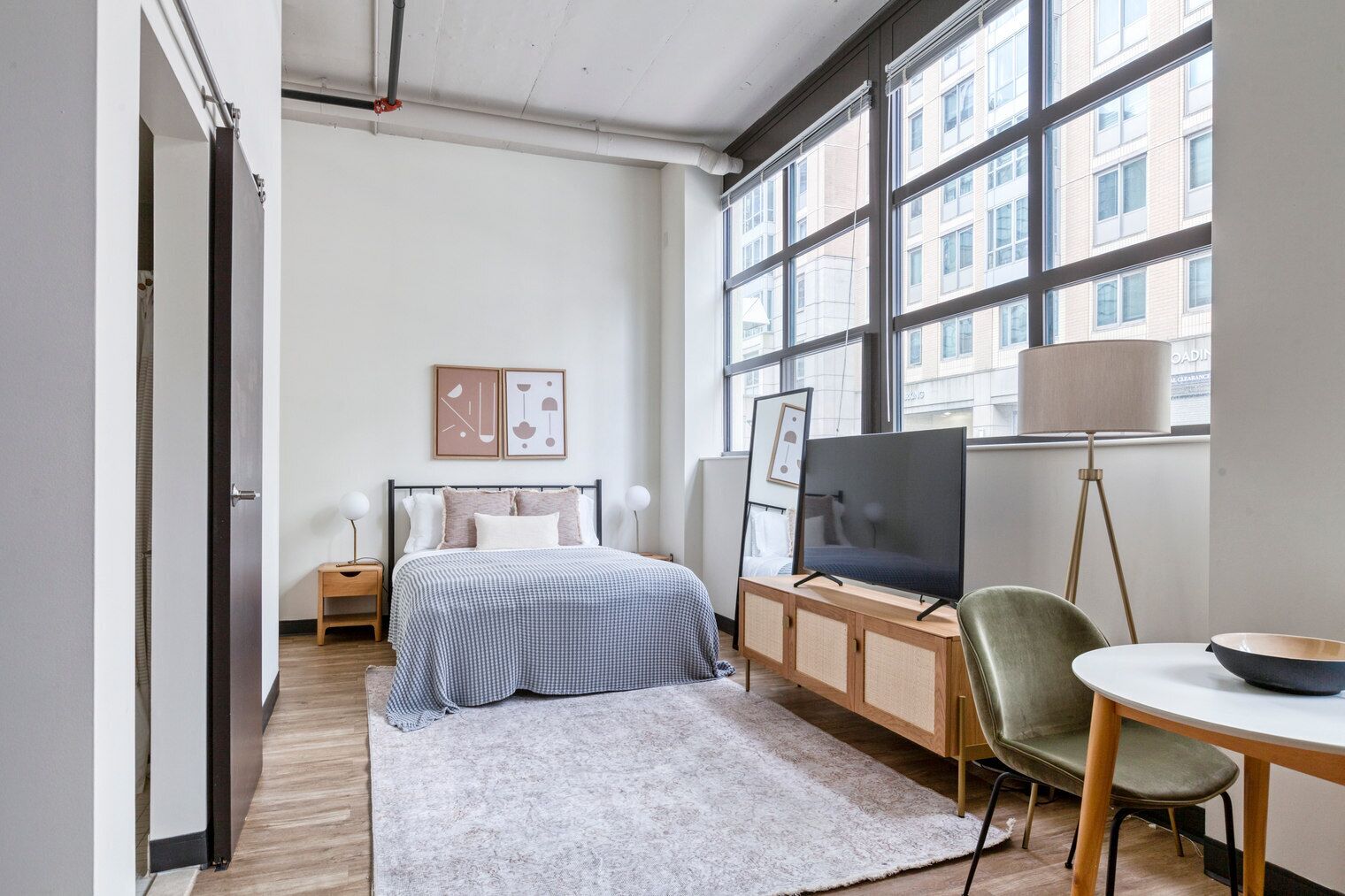 Ideal East Cambridge studio w/ W/D & Gym, steps from Train, by Blueground