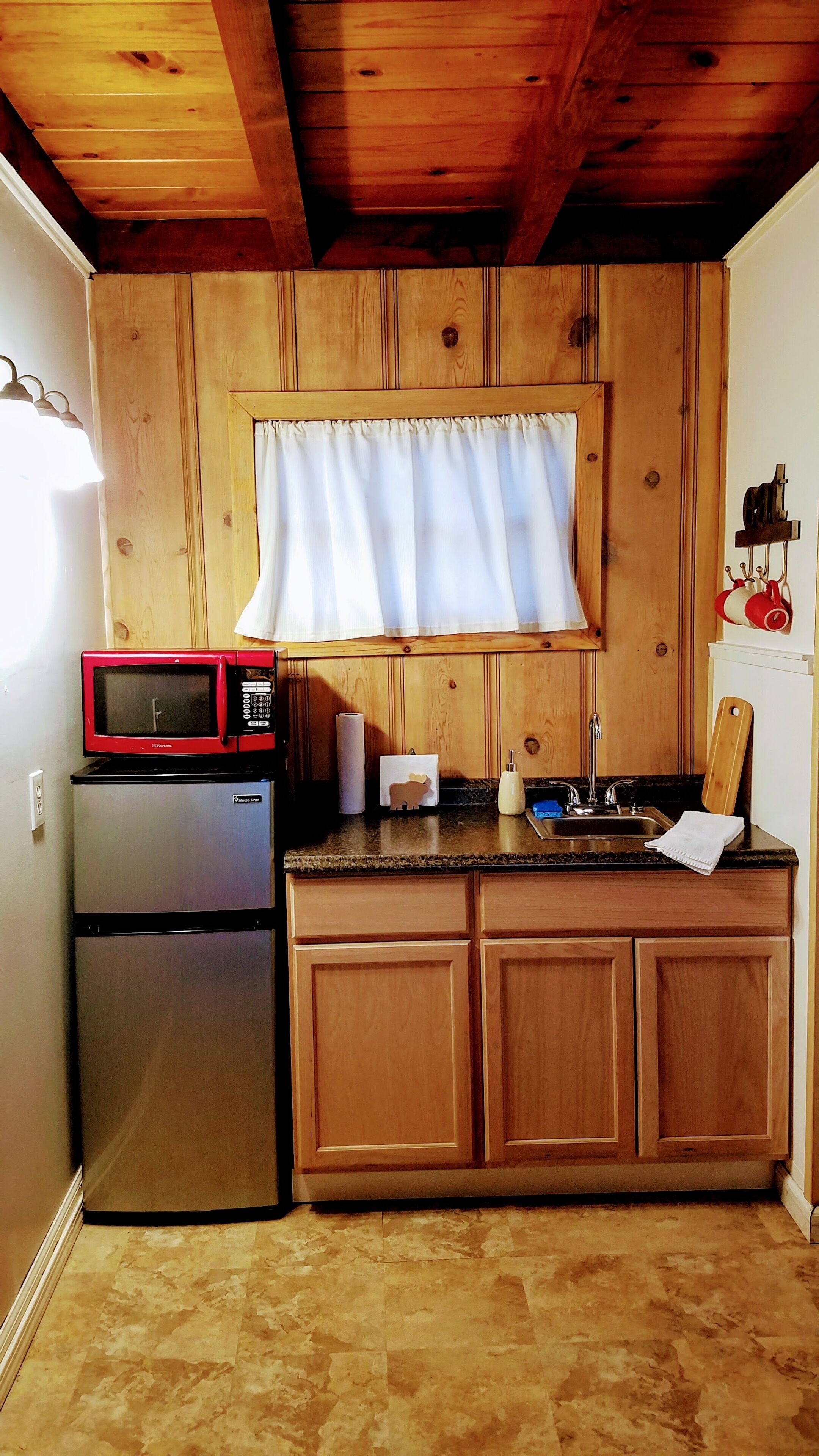 Fridge, microwave, cookware/dishes/utensils