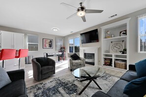 Smart TV, fireplace, video games, table football