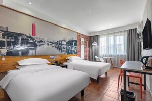 A hotel room with two beds, a dining table, a TV, and a mural of a cityscape. - Tuke China Hotel (Pingyang Aojiang Pearl Plaza Store) (Pingyang)