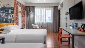 A hotel room with two beds, a desk, a chair, a TV, and a window with curtains. - Tuke China Hotel (Pingyang Aojiang Pearl Plaza Store) (Pingyang)
