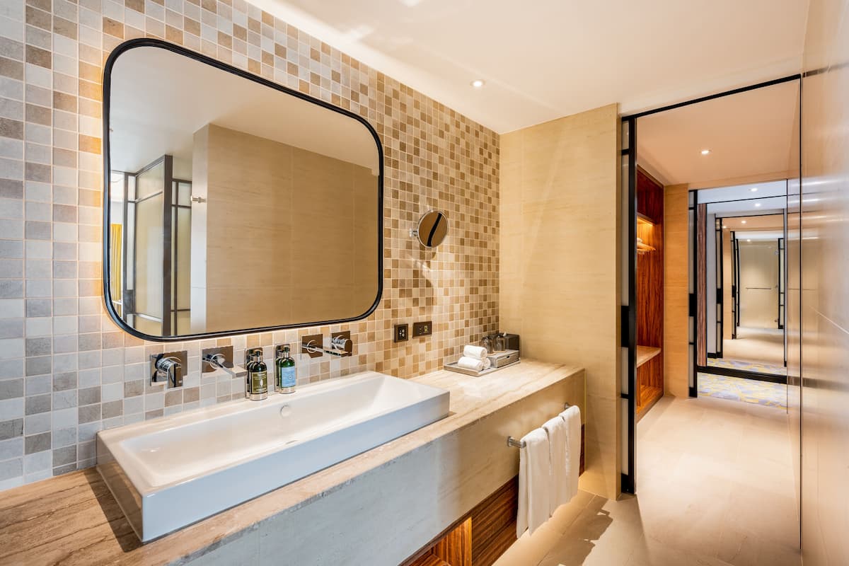 separate bathtub and shower, free toiletries, hair dryer, bathrobes