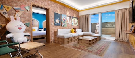 LINE FRIENDS Balcony Suite - Twin | Living area | 55-inch Smart TV with digital channels, TV