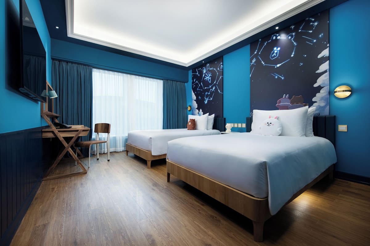 Premium bedding, down duvets, in-room safe, desk