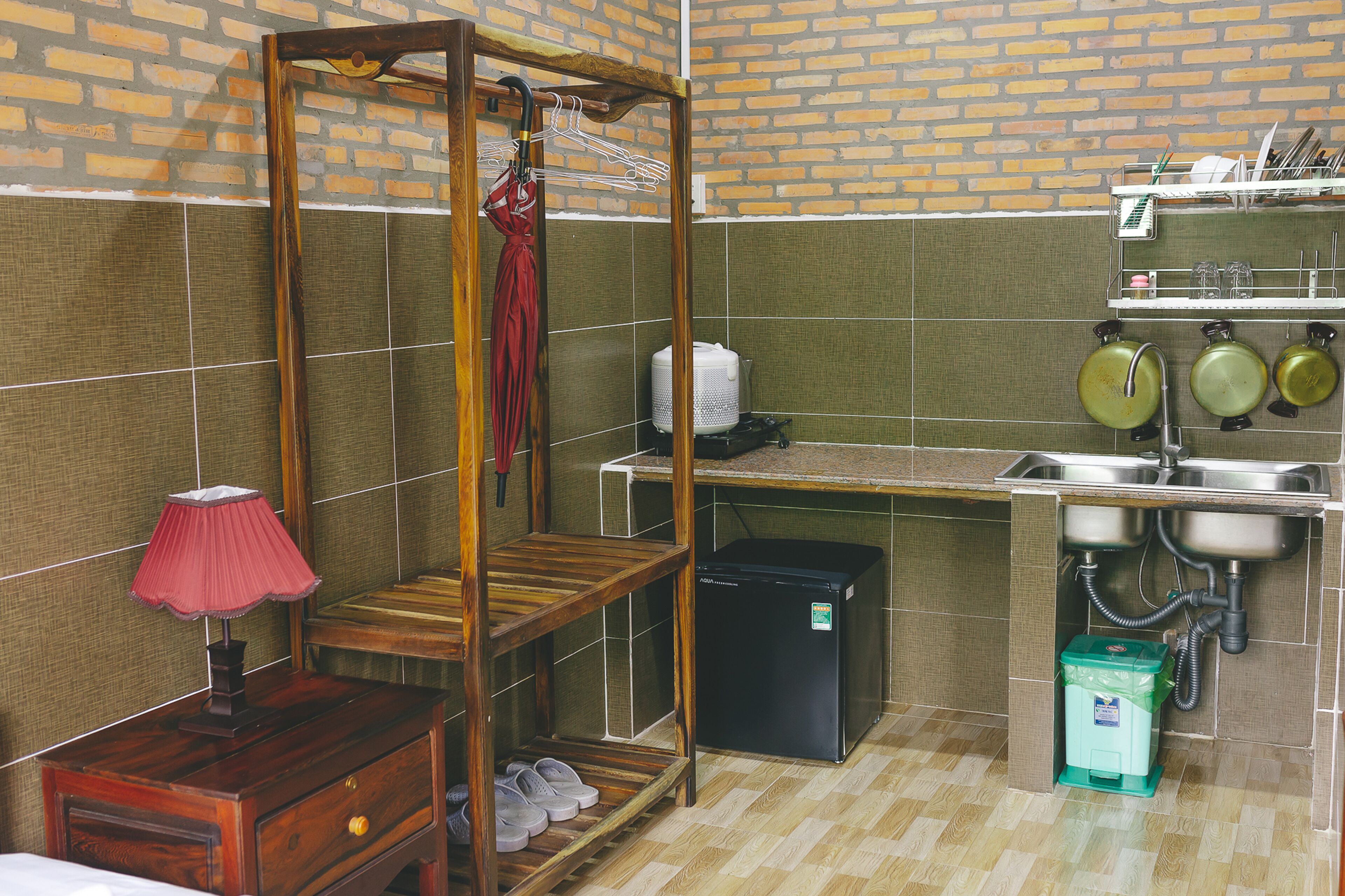 mini-fridge, stovetop, rice cooker, cookware/dishes/utensils