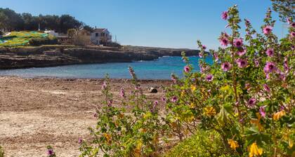 Casa de vacaciones con vistas al mar, bonita terraza privada junto a la playa
