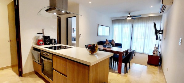 Coffee/tea maker, fridge, microwave, oven