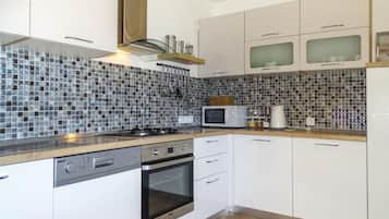 Family Villa, 4 Bedrooms, 2 Bathrooms (Villa Cujez With Sauna And Pool) | Private kitchen | Fridge, microwave, oven, stovetop