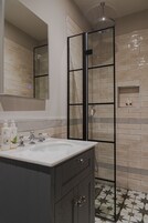 Designer toiletries, hair dryer, bathrobes, slippers