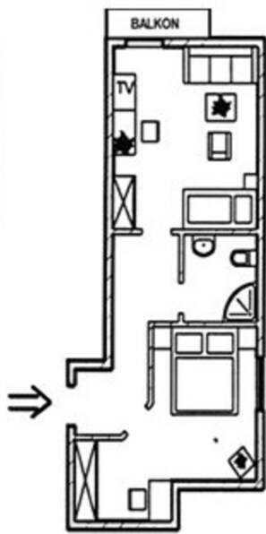 Suite | Zona de estar | Una televisión