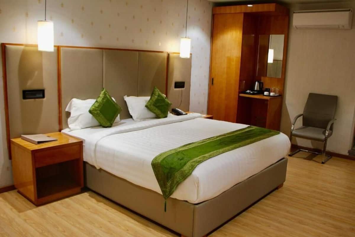 Habitación Deluxe | Ropa de cama de alta calidad y wifi gratis