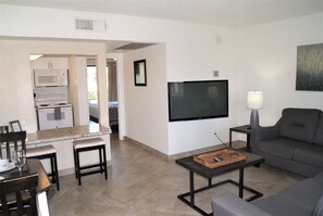 Apartment, 1 Bedroom | Living area | TV, fireplace
