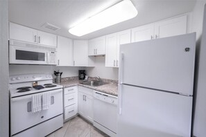Departamento, 1 habitación | Cocina privada | Refrigerador, horno, cafetera y tetera y tostadora 