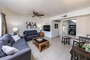 Apartment, 1 Bedroom | Living area | TV, fireplace