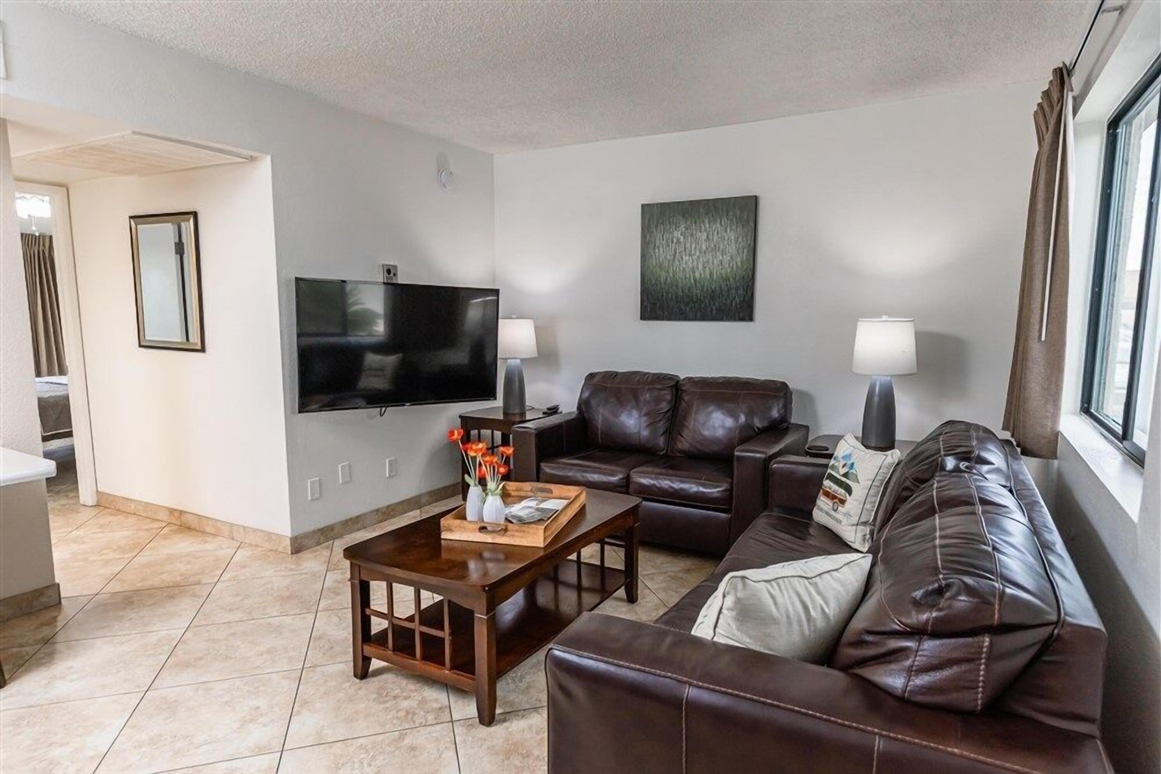 Apartment, 1 Bedroom | Living area | TV, fireplace