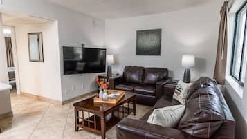 Apartment, 1 Bedroom | Living area | TV, fireplace