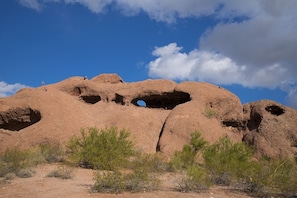 A rocky landscape with a large cave-like opening. - 222 Fully Furnished with WiFi by RedAwning (Scottsdale)