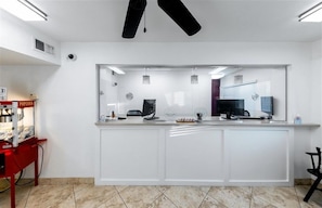 Welcome to our reception area, featuring a sleek reception desk and a modern atmosphere.