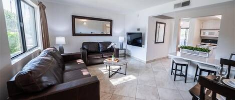 Apartment, 1 Bedroom | Living area | TV, fireplace