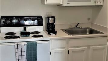 Fridge, oven, coffee/tea maker, toaster