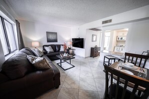 Apartment, 1 Bedroom | Living area | TV