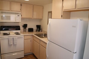 Apartment, 1 Bedroom | Private kitchen | Fridge, oven, coffee/tea maker, toaster