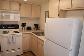 Apartment, 1 Bedroom | Private kitchen | Fridge, oven, coffee/tea maker, toaster