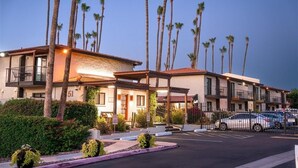 A hotel with multiple floors, a covered entrance, and a parking area. - 244 Fully Furnished 1BR Suite-Pet Friendly! by RedAwning (Scottsdale)