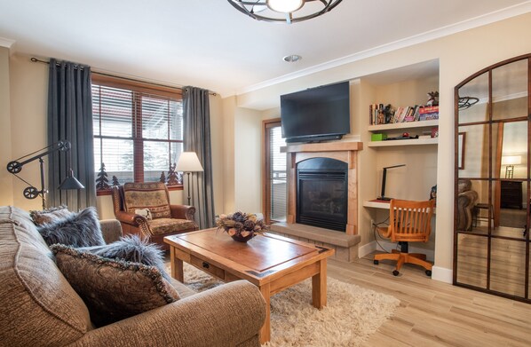 Condo, 2 Bedrooms | Living room | Flat-screen TV