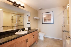 A modern bathroom with a sink, mirror, and toilet. - Fraser Crossing/Founders Pointe, Condo | Top Floor Ski-In/Ski-Out (Premium-Rated Condo 3622) (Winter Park)